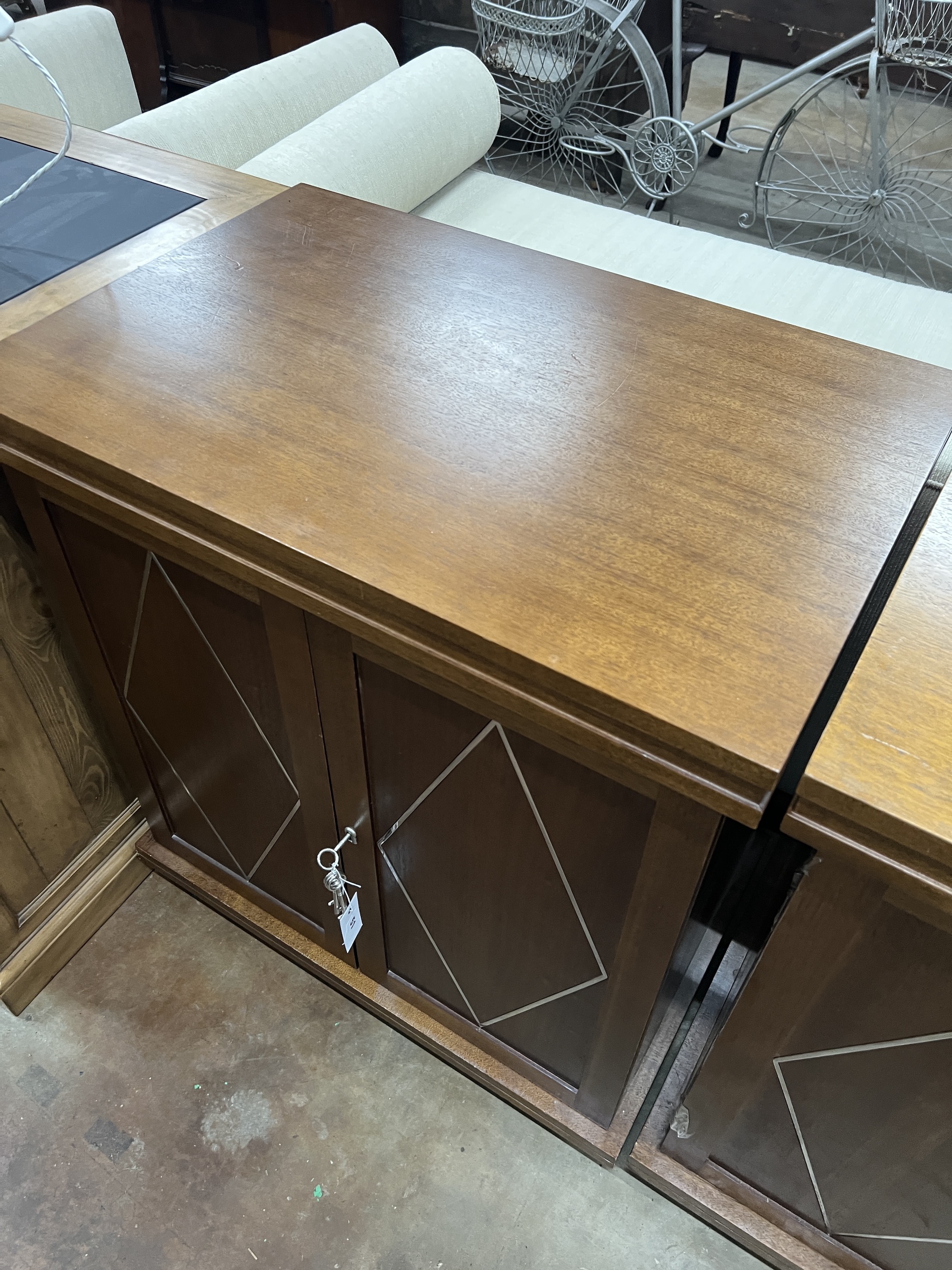 A contemporary South African chrome inlaid mahogany hardwood side cabinet, width 75cm, depth 50cm, height 85cm